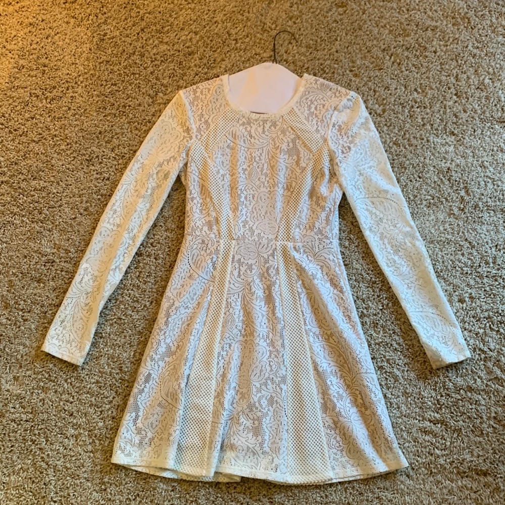 In new condition, BCBGMaxAzria dress size XXS.